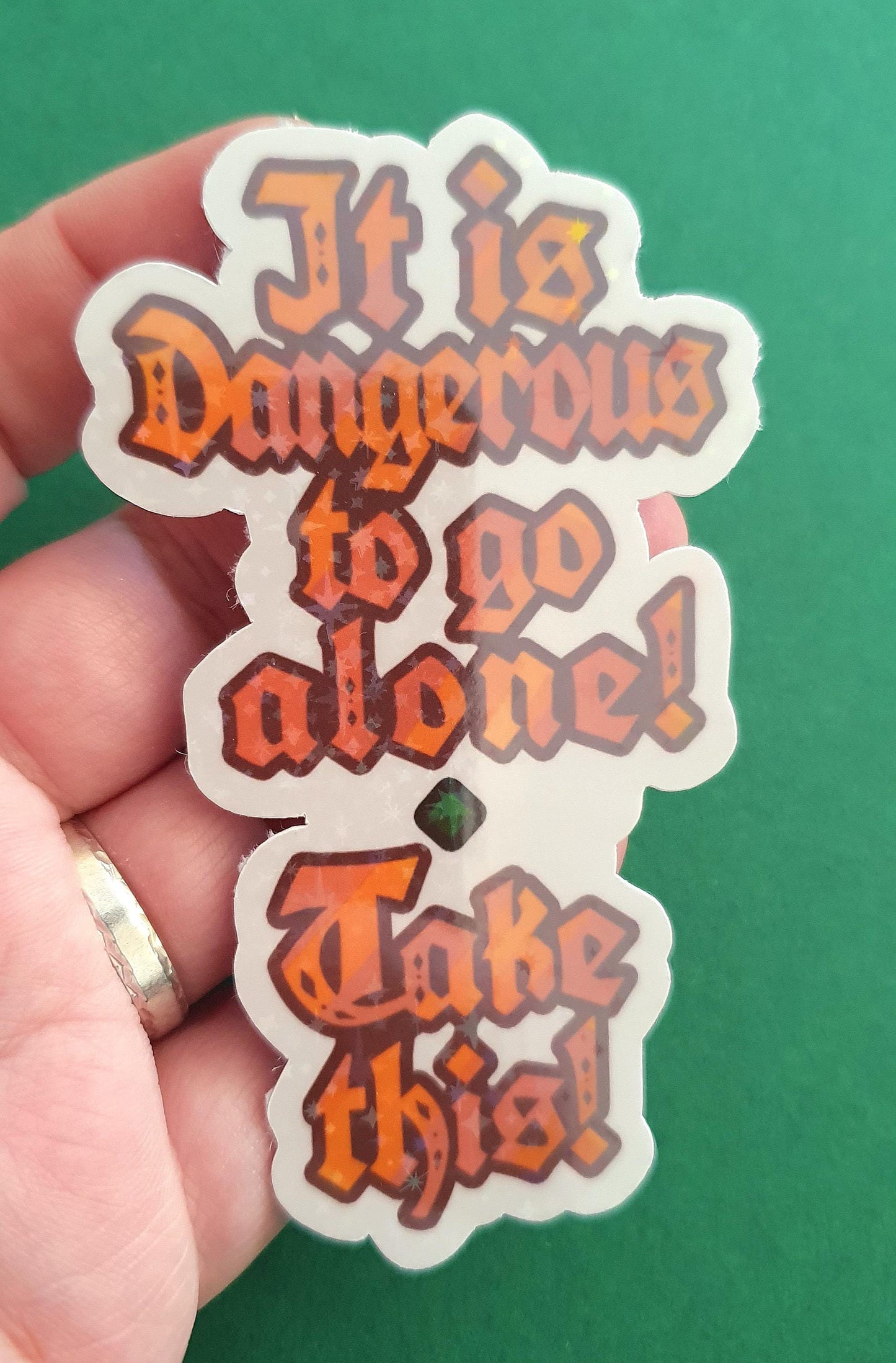 It is dangerous to go alone! Take this! - big gaming quote sticker, water resistant