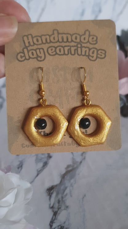 Meltan inspired earrings - hand made in polymer clay