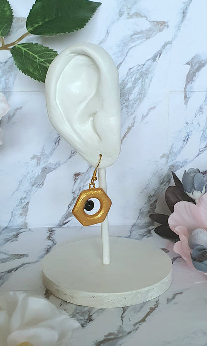 Meltan inspired earrings - hand made in polymer clay