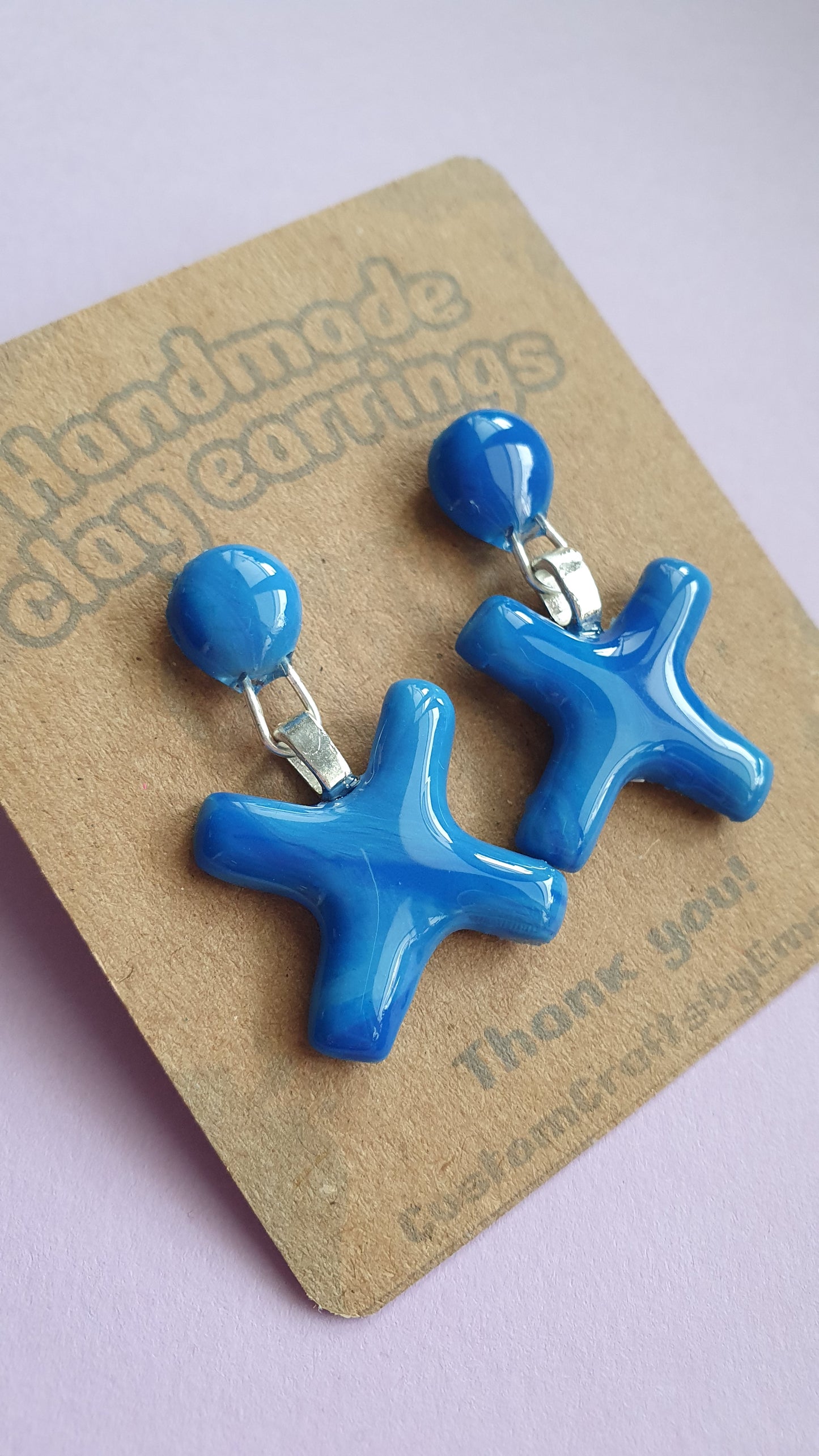 Blue Cross - Hand made polymer clay stud earrings