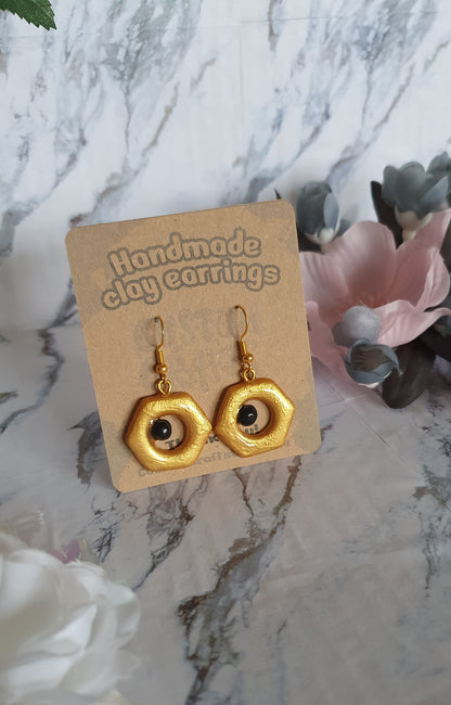 Meltan inspired earrings - hand made in polymer clay