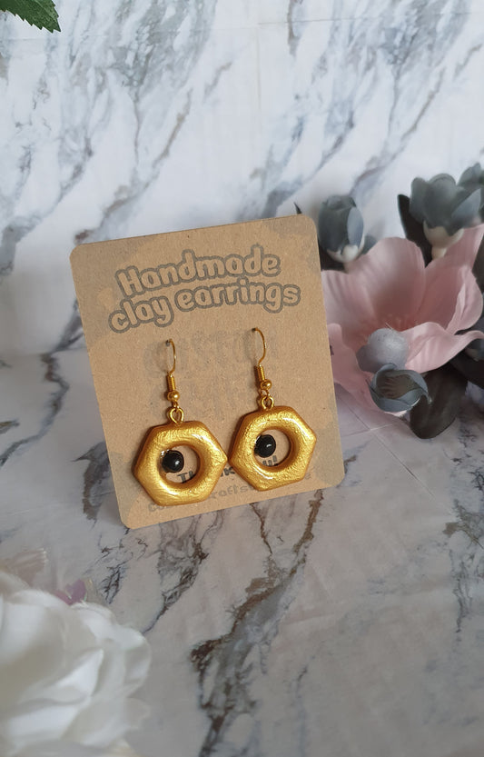 Meltan inspired earrings - hand made in polymer clay
